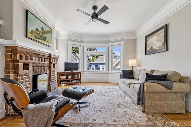 207 Eureka St, San Francisco, CA 94114 - living room featuring a fireplace, crown molding, a ceiling fan, and wood finished floors