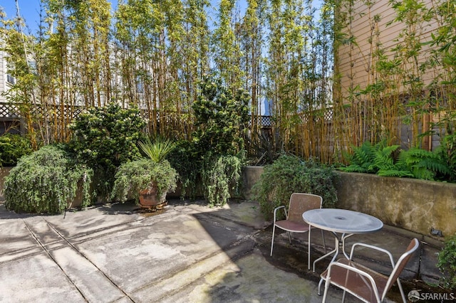 view of patio / terrace with fence