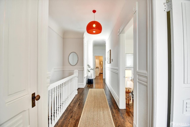 27 Hartford St, San Francisco, CA 94114 - hall featuring dark wood-style flooring, a wainscoted wall, and a decorative wall