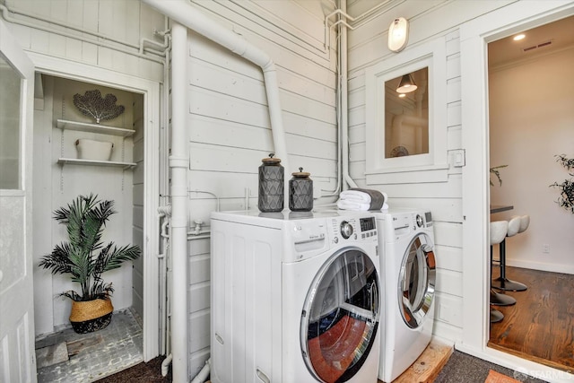 27 Hartford St, San Francisco, CA 94114 - washroom with washing machine and clothes dryer and wood finished floors