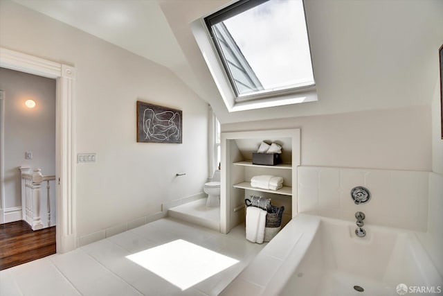27 Hartford St, San Francisco, CA 94114 - bathroom with a skylight, a bath, and vaulted ceiling