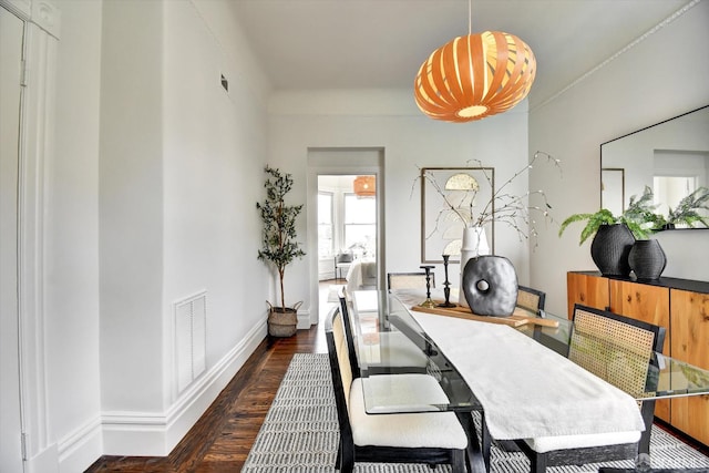 27 Hartford St, San Francisco, CA 94114 - dining space featuring dark wood-type flooring and baseboards