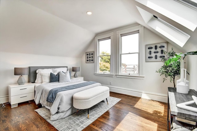 27 Hartford St, San Francisco, CA 94114 - bedroom with dark wood finished floors, vaulted ceiling, and a skylight