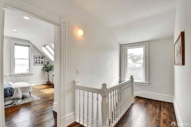 27 Hartford St, San Francisco, CA 94114 - hall with lofted ceiling, an upstairs landing, healthy amount of natural light, and wood finished floors