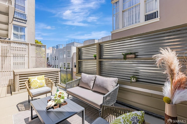 1734 Bay St Unit 103, San Francisco, CA 94123 - wooden terrace with an outdoor hangout area and a residential view