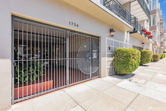 1734 Bay St Unit 103, San Francisco, CA 94123 - doorway to property featuring a gate and stucco siding