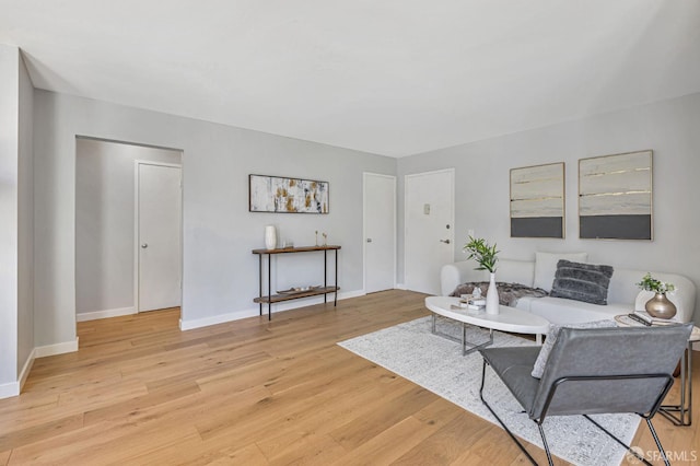 1734 Bay St Unit 103, San Francisco, CA 94123 - living room with light wood-style flooring and baseboards
