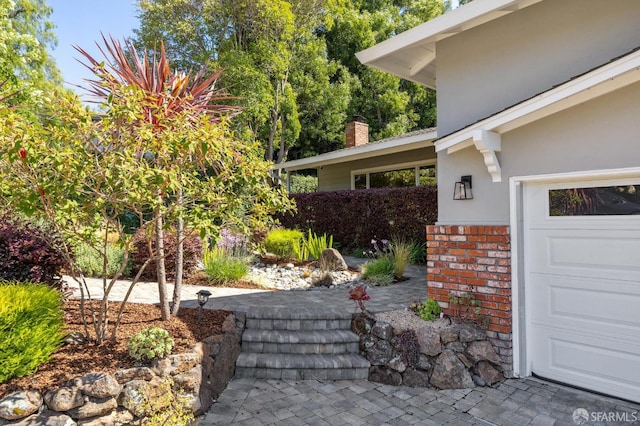 744 Crompton Rd, Redwood City, CA 94061 - doorway to property featuring a chimney, stucco siding, and brick siding