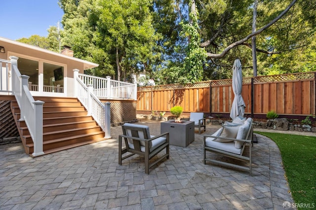 744 Crompton Rd, Redwood City, CA 94061 - fenced backyard featuring a fire pit, a patio, stairs, and a deck