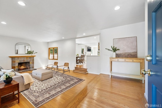 744 Crompton Rd, Redwood City, CA 94061 - living area with a fireplace, light wood-style flooring, and recessed lighting
