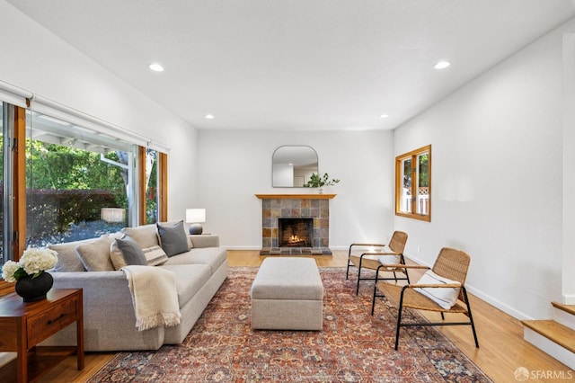 744 Crompton Rd, Redwood City, CA 94061 - living area featuring wood finished floors, recessed lighting, and a tiled fireplace