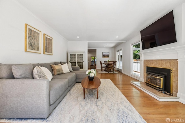 744 Crompton Rd, Redwood City, CA 94061 - living area with wood finished floors, recessed lighting, and crown molding