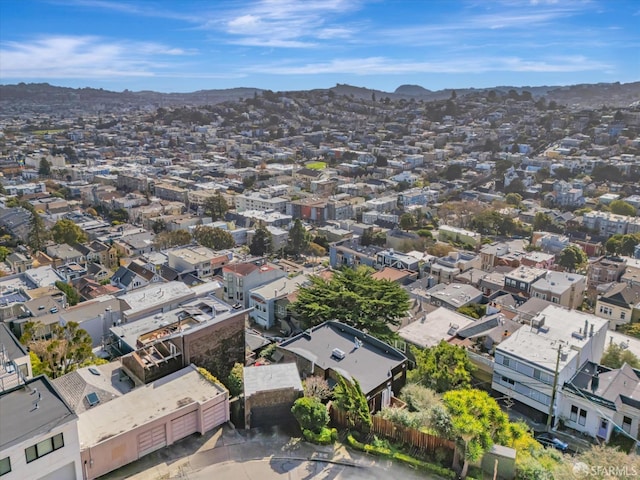 drone / aerial view with a residential view and a mountain view