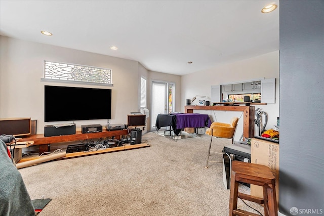 carpeted living room featuring recessed lighting