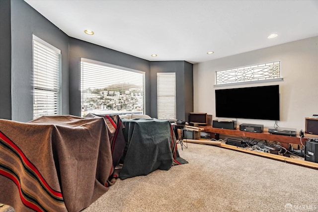 living room featuring recessed lighting and carpet flooring