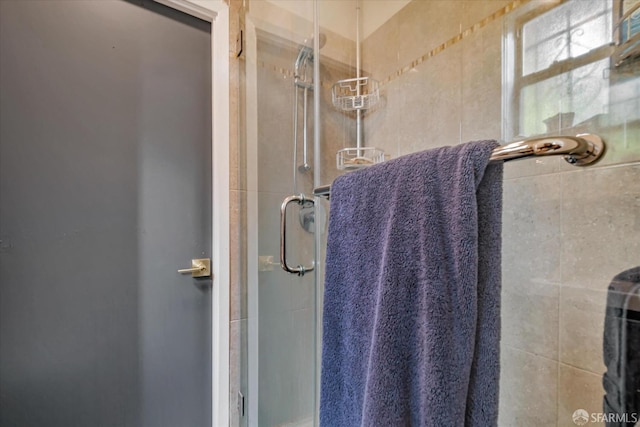 full bathroom featuring a stall shower