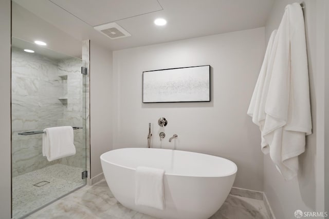 bathroom featuring marble finish floor, recessed lighting, a soaking tub, visible vents, and a shower stall