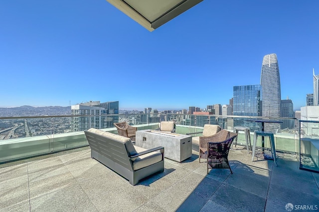 view of patio featuring a balcony