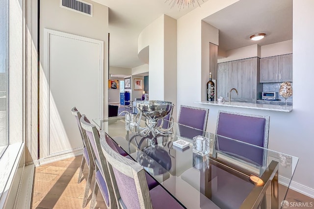 dining room featuring sink