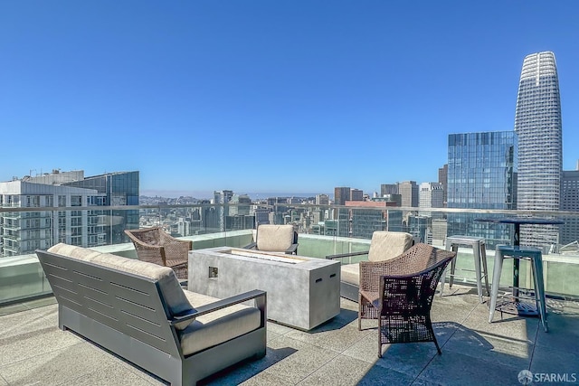 view of patio featuring a balcony