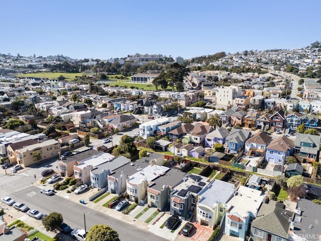 birds eye view of property with a residential view