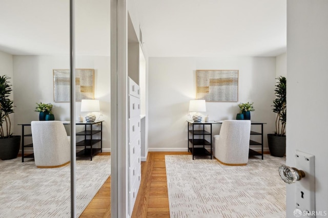 office featuring baseboards and wood finished floors