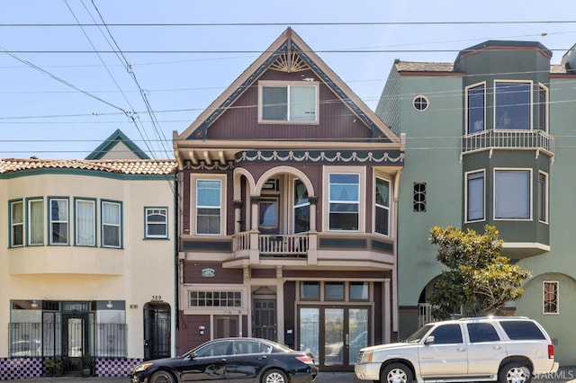 view of front of property with a balcony