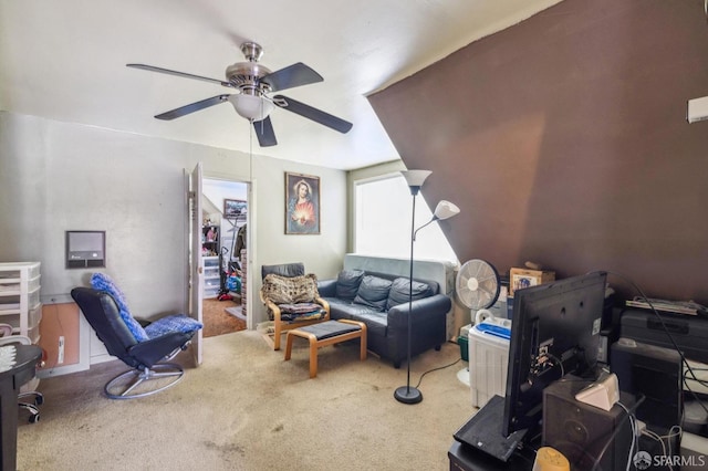 carpeted living room featuring ceiling fan