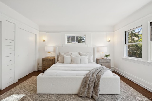 bedroom featuring wood-type flooring