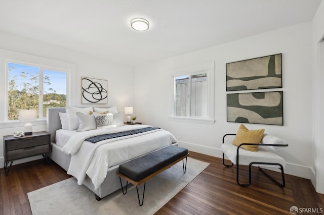 bedroom featuring dark hardwood / wood-style flooring