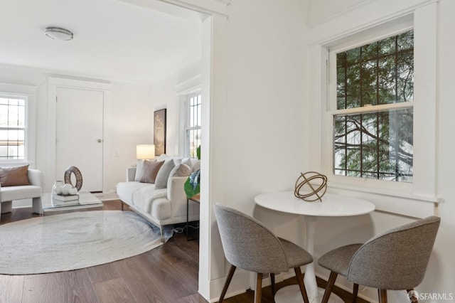 dining space with dark hardwood / wood-style floors