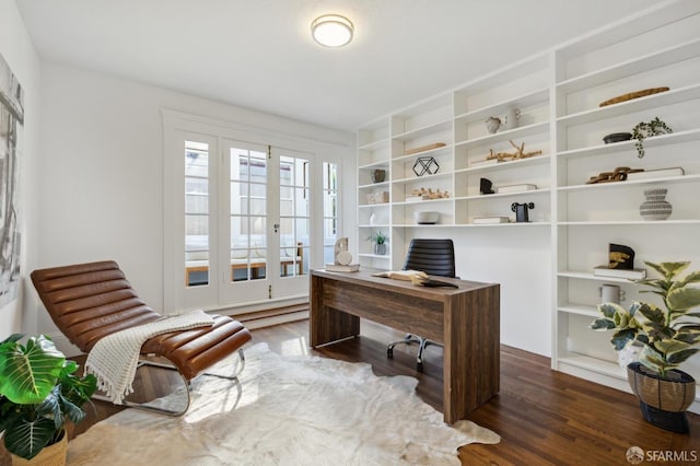 office with dark hardwood / wood-style flooring and french doors