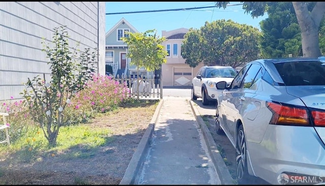 exterior space featuring curbs and sidewalks