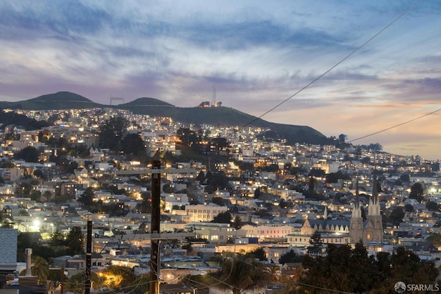 view of mountain feature with a view of city