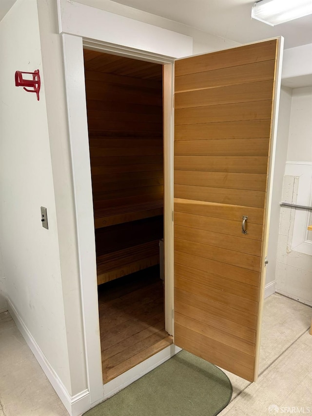 view of sauna / steam room featuring baseboards