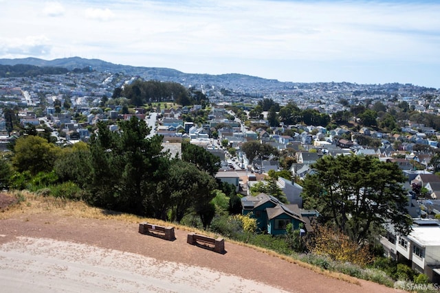 drone / aerial view with a mountain view and a residential view