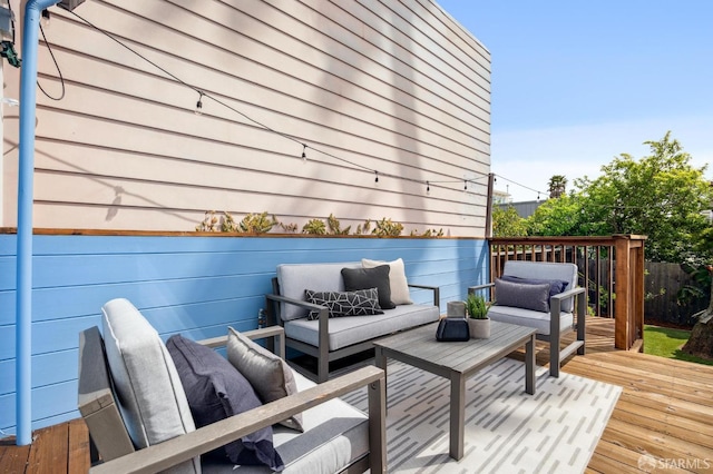 deck featuring an outdoor living space