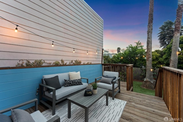 deck featuring outdoor lounge area
