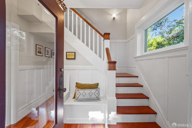 staircase featuring hardwood / wood-style floors