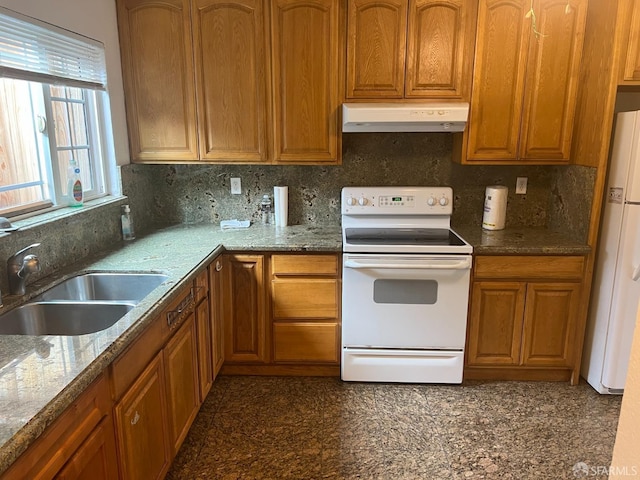 2113 Mandarin Way, Antioch, CA 94509 - kitchen featuring white appliances, decorative backsplash, under cabinet range hood, brown cabinets, and a sink
