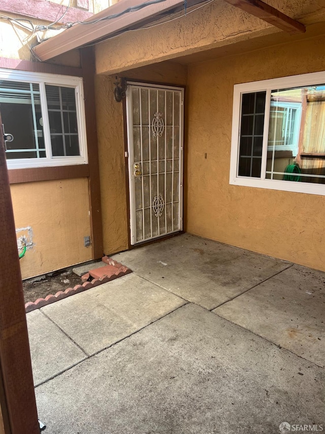 2113 Mandarin Way, Antioch, CA 94509 - entrance to property with stucco siding and a patio
