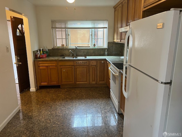 2113 Mandarin Way, Antioch, CA 94509 - kitchen with a sink, granite finish floor, baseboards, white appliances, and brown cabinetry