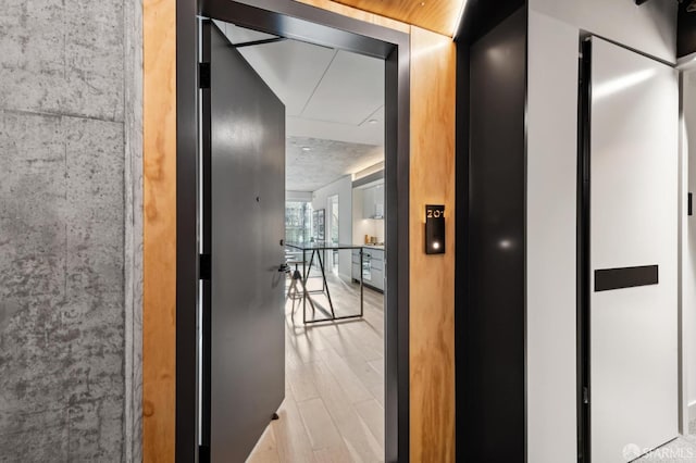 hallway featuring light wood-type flooring