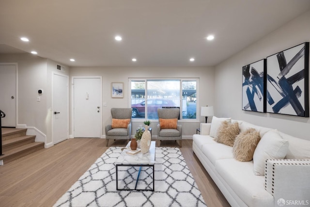 living room with light hardwood / wood-style floors