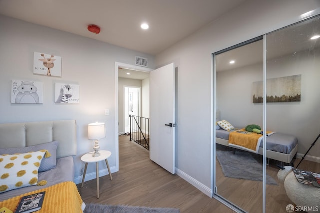 living area featuring hardwood / wood-style floors