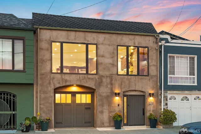 view of front of property featuring stucco siding