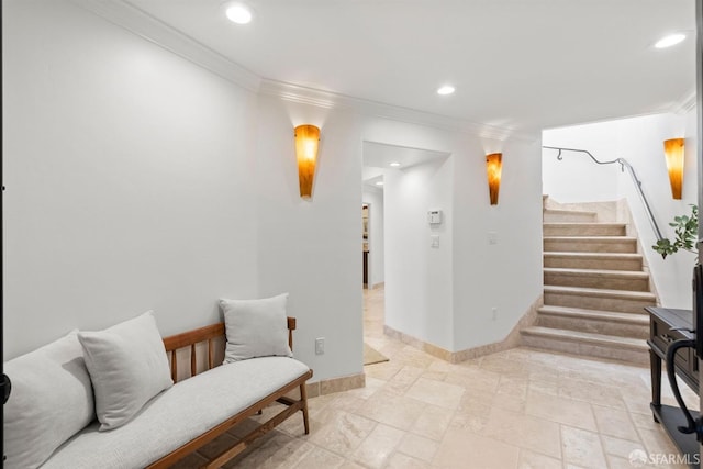 interior space featuring recessed lighting, baseboards, ornamental molding, and stairs