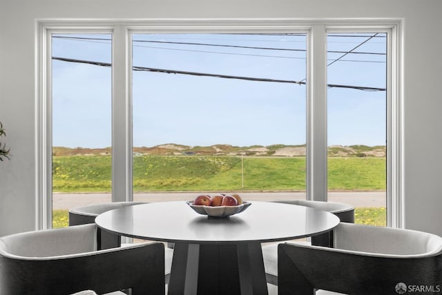 sunroom / solarium with a wealth of natural light