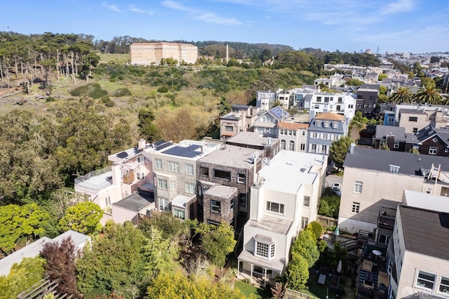 birds eye view of property with a residential view