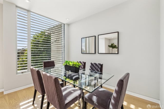 dining area featuring light hardwood / wood-style floors